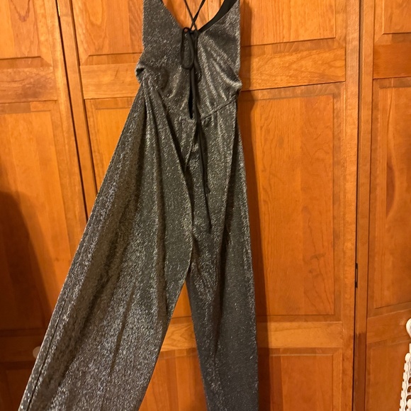 Pants - NWT Silver Shimmer halter tie back  jumpsuit